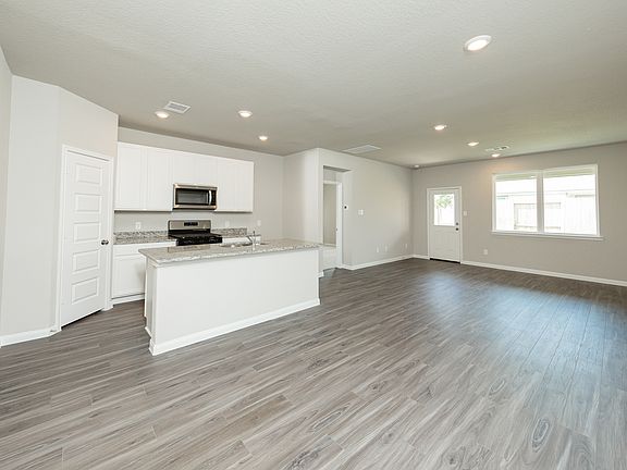Dining Area to Kitchen and Family Room