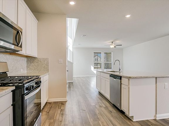Cook a delicious meal in this spacious kitchen.