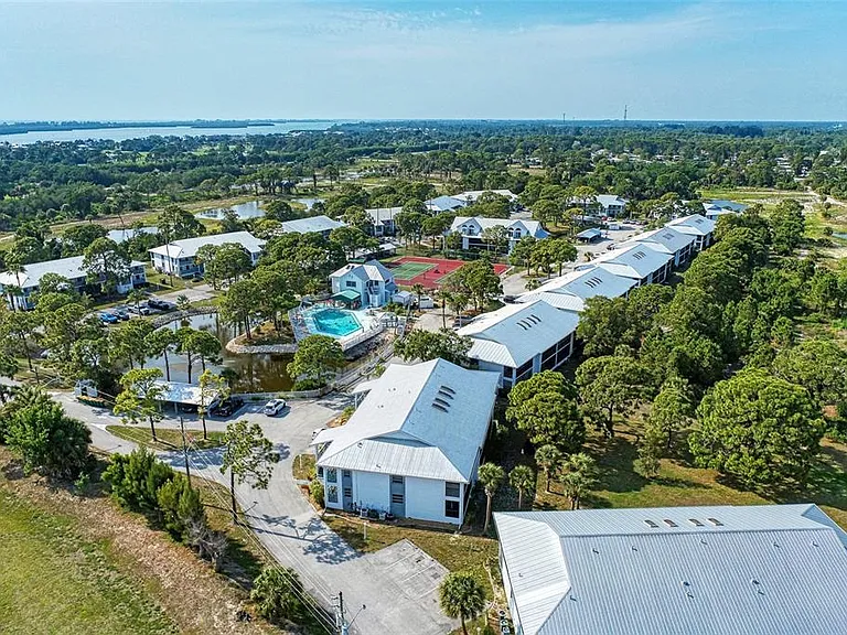 __ From high above, you can see why we love Fiddler's Green so much. Tucked between the lush Lemon Bay Preserve and the sparkling Gulf Coast, it's the ultimate tropical home base.
