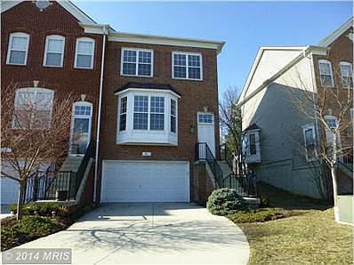 End unit TH with 2 car garage