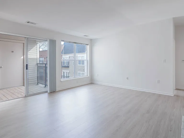 Living Room with Balcony and Hard Surface Flooring