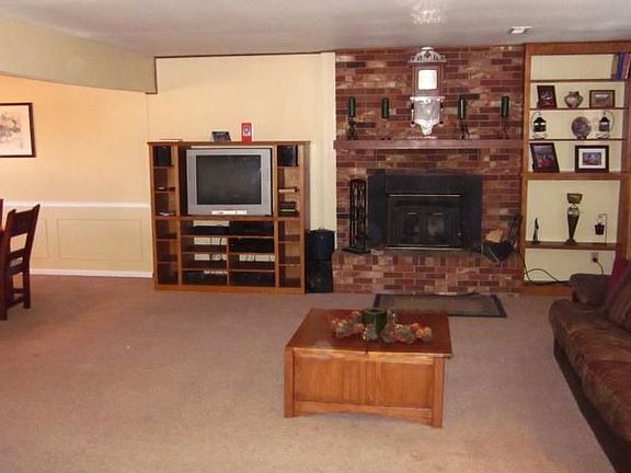 Large living room with built-in bookshelves