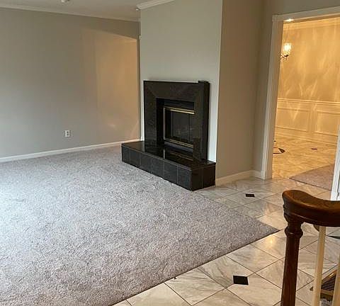 living room with gas fireplace