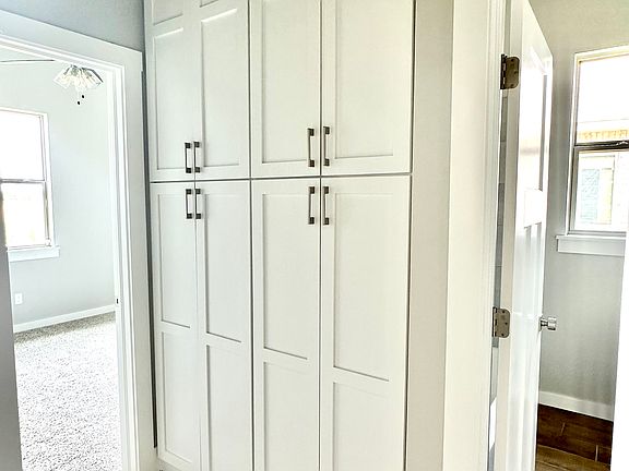 Floor to ceiling hall cabinetry