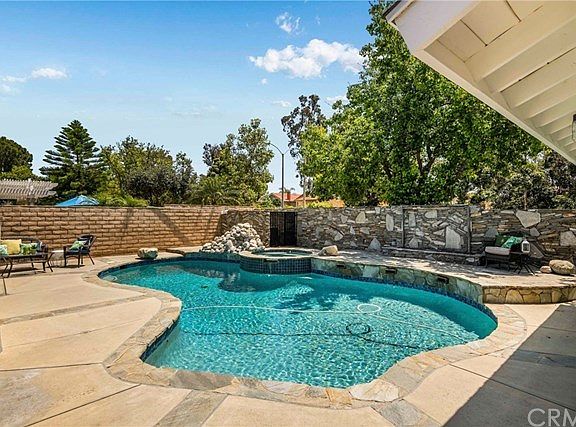 Enjoy the CA lifestyle with a dip in your salt water pool and spa; relax in your private yard enjoying the fountains and waterfall!