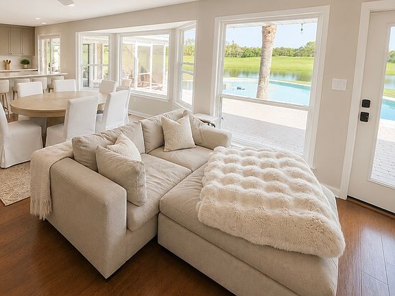 Open floor plan facing pool and golf course