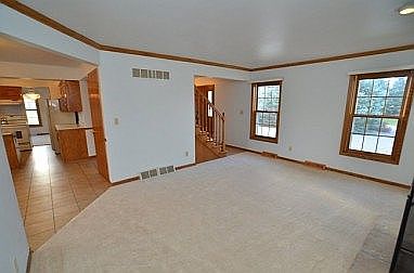 Open to Kitchen & Foyer