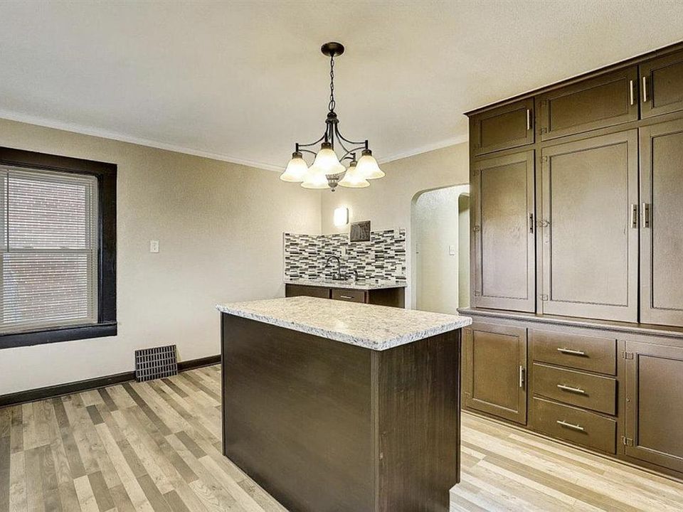 Granite Countertops and Updated Cabinets