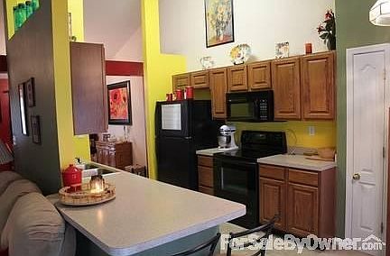 Kitchen
						:
						Lots of counter space and easy access from the living and dining rooms