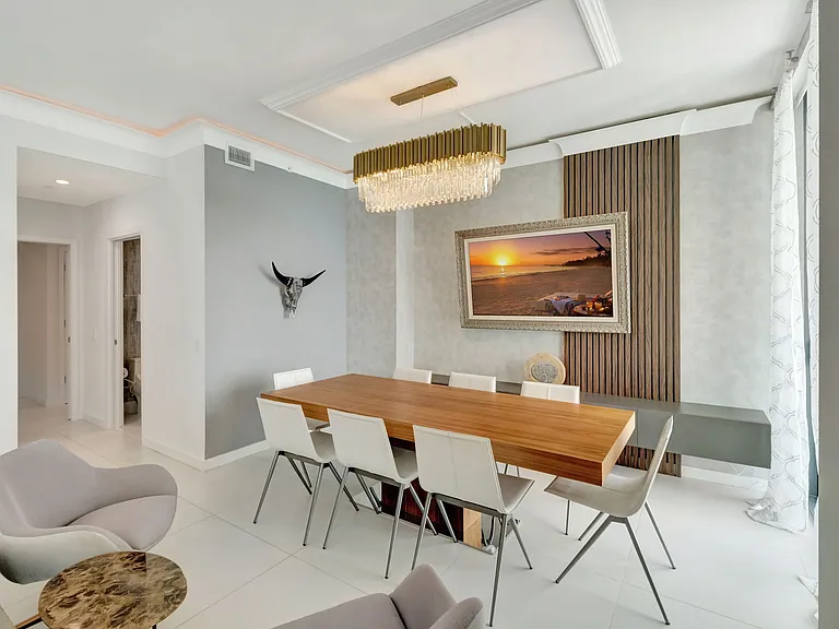 Dining Room / Enjoy Unobstructed water views and access to the Balcony from every room.