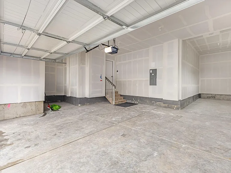 3 Car Tandem Garage with extra space for to the left in back