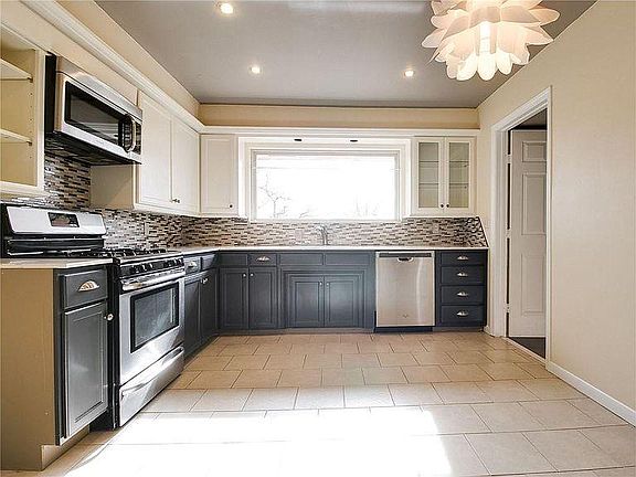 Front view of kitchen...side door goes to laundry/mud room.