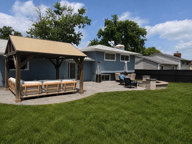 Backyard 1100 sq ft patio (pavilion has ceiling fan and electric to have a TV under it).