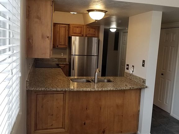 Stainless steel appliances.  New dishwasher, granite counter