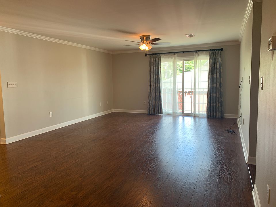 main living area with sliding doors to balcony