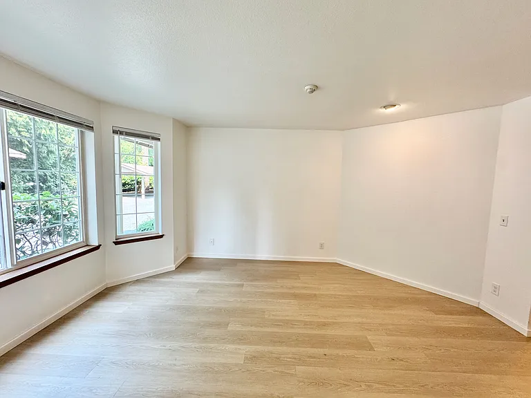 New flooring and fresh paint throughout unit.