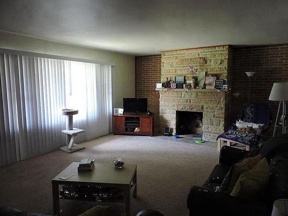 Either new carpet or hardwood will be installed in the livin