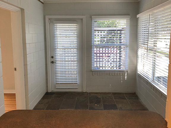 Kitchen pass-thru to breakfast room or home office which opens to front deck