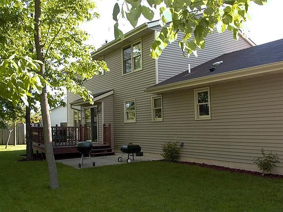 Back of home; deck and patio