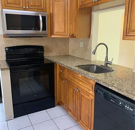5th image of 713 Gardens Dr APT 101