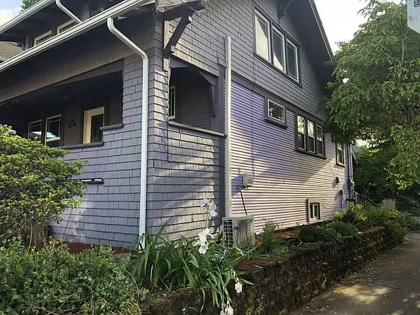 Side yard and sidewalk on SE Alder