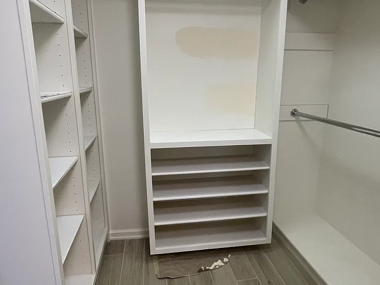 Master closet with built-ins. (Showing only half)