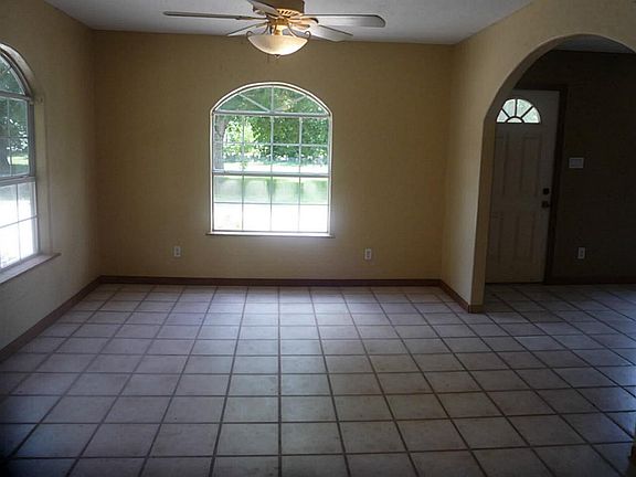 The Dining Room Looks Out into the Front Yard