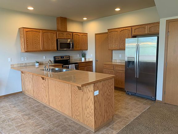 Kitchen with stainless steel appliances.