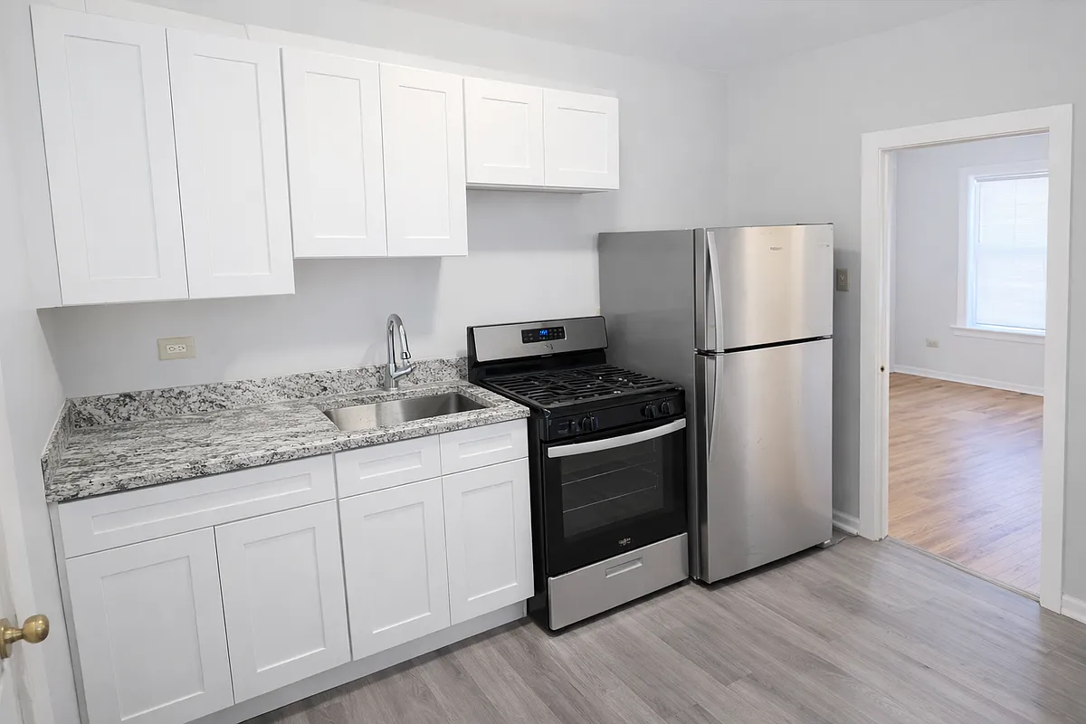 Building Photo - 6716 S Merrill Ave #3E
