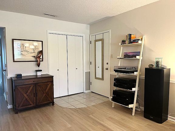 Front door and coat closet