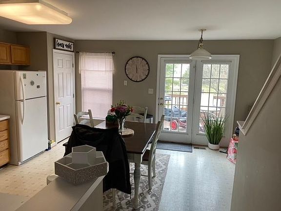 Kitchen with deck behind double doors