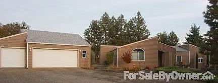 Front Entry
						:
						Open and covered entry with freestanding arched opening