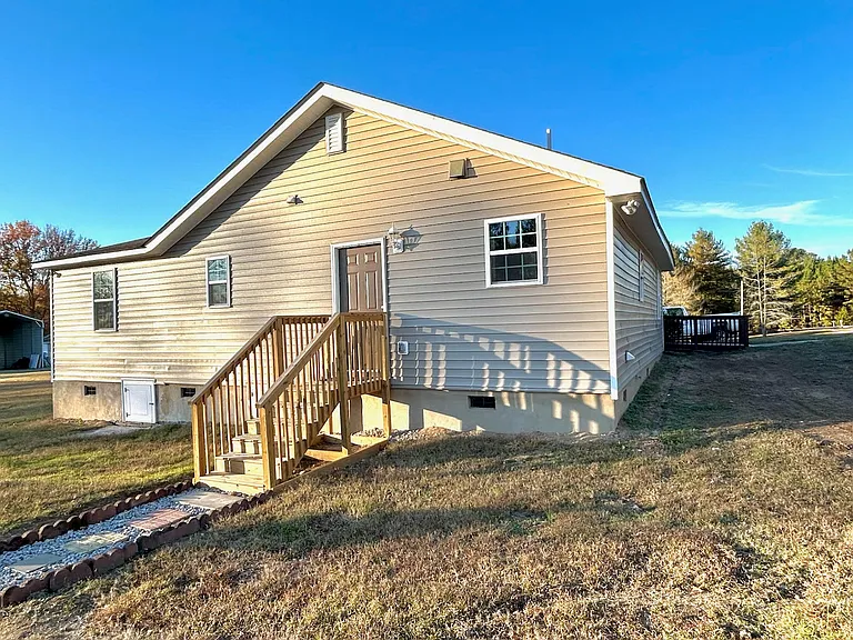 Back door leads to mudroom, full bath & Laundry