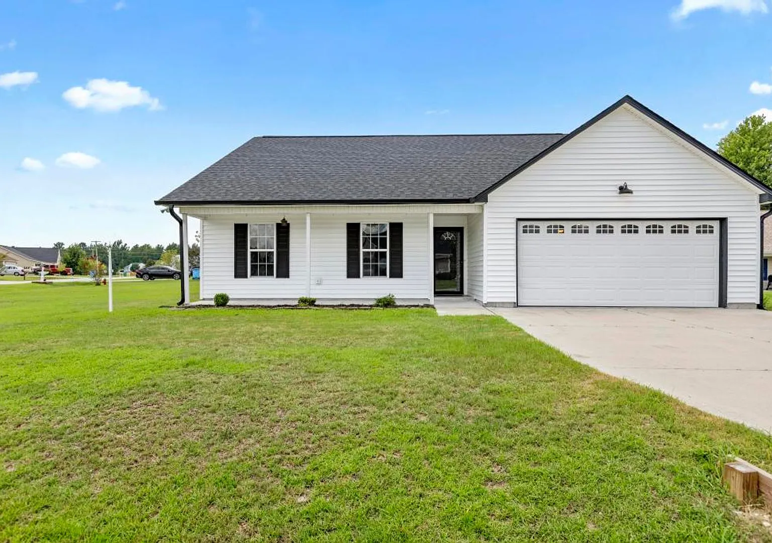 Corner-Lot Gem with Bonus Garage Space & Entertainer's Backyard! — Photo 1