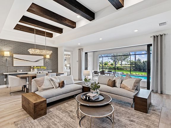 Connected gathering room with dual tray ceiling