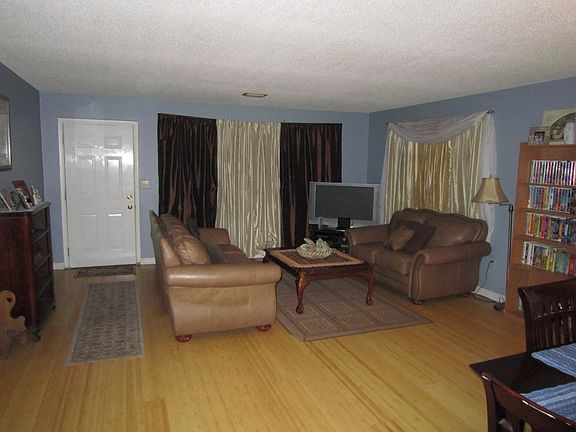 Living area has beautiful hard wood floors