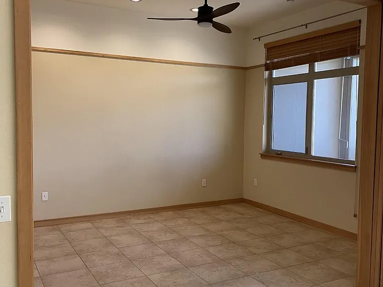 Master bedroom with fan, nice mountain view from window