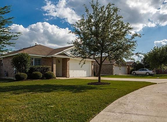 Sits on the corner with private drive in front.