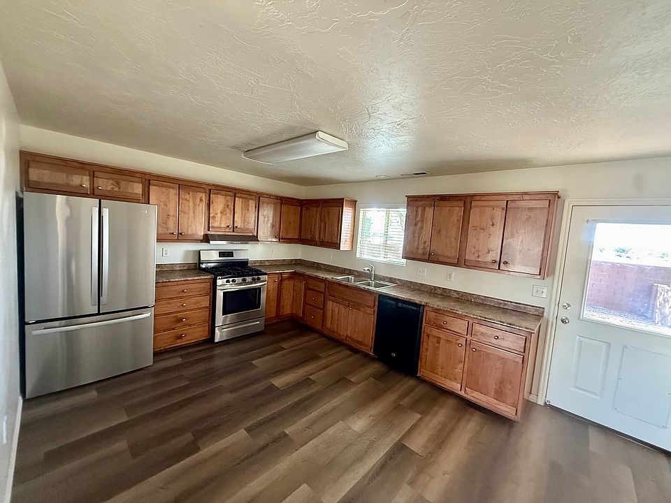 Kitchen with door to the enclosed back yard