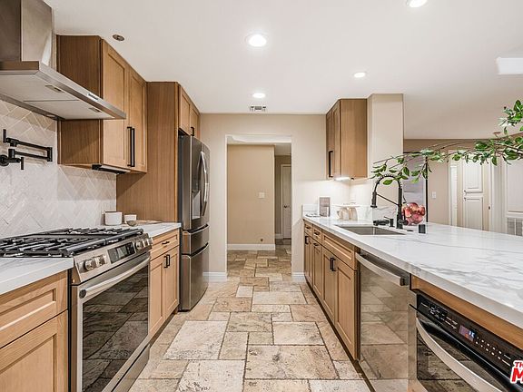 2nd image of 575 S Barrington Ave APT 107