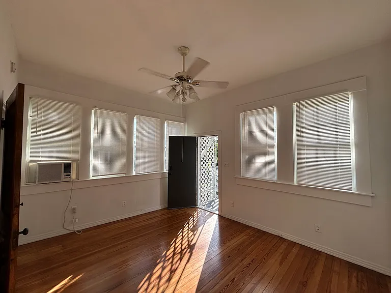 Bedroom with door to the backyard
