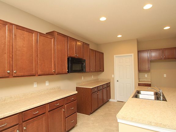 Kitchen with island and custom cabinets