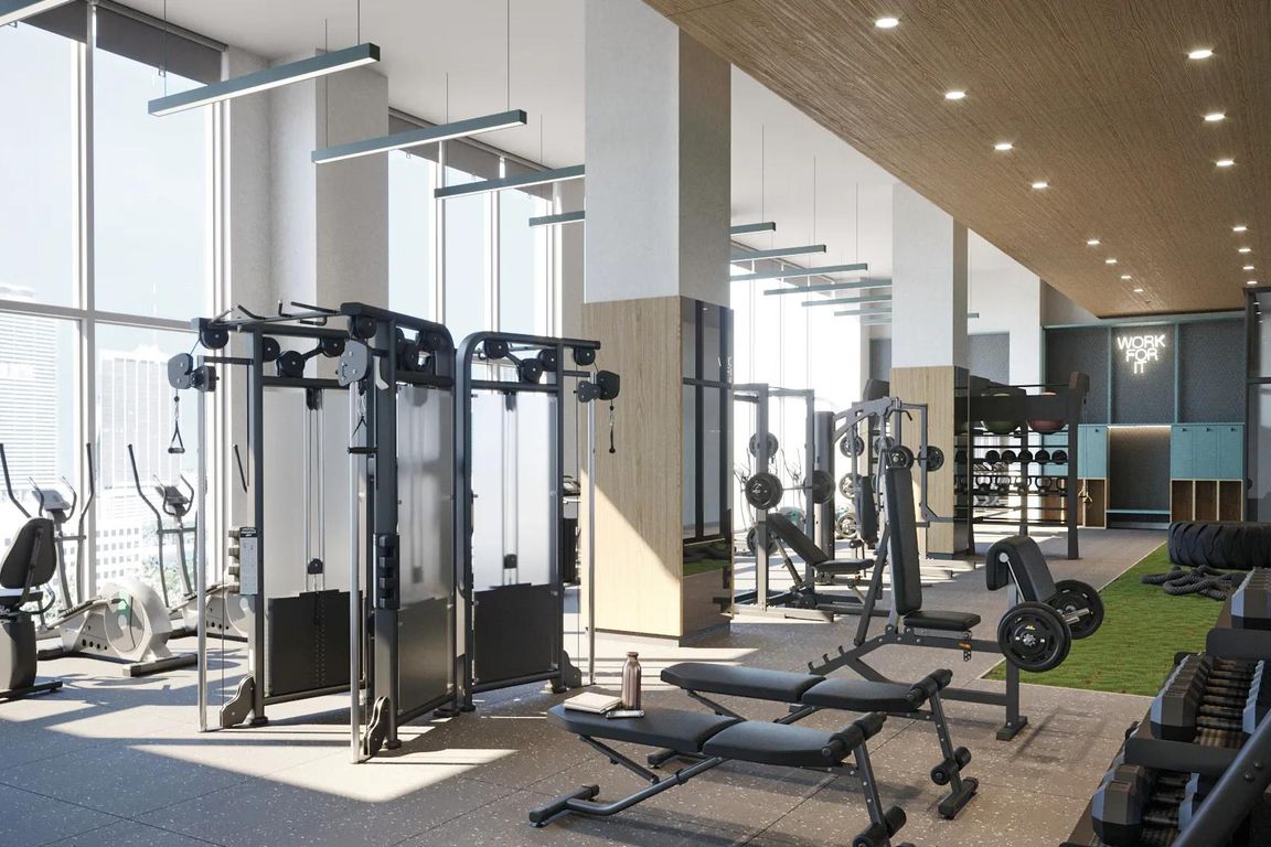 Club-quality fitness studio with TRX station accessible 24/7 at Modera Riverside in Miami, FL.