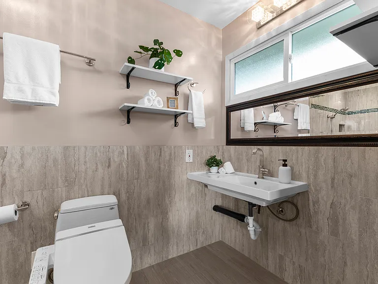 Primary Bathroom (Photos shown are professionally staged. Home is rented unfurnished)