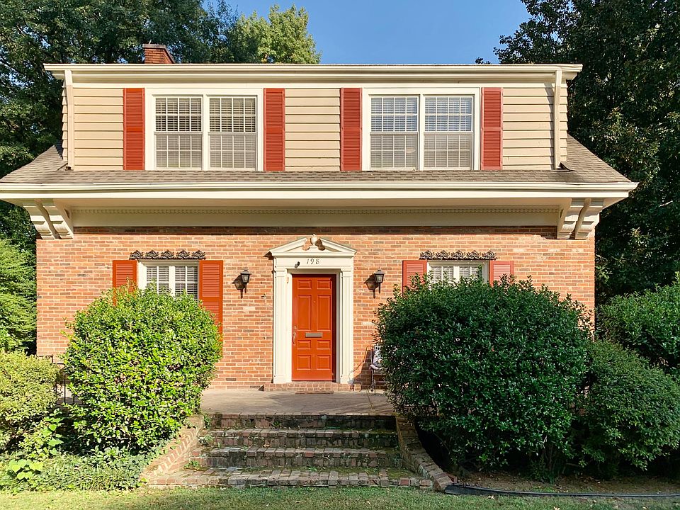 The front of this lovely place overlooks beautiful tree lined Belvedere Blvd
