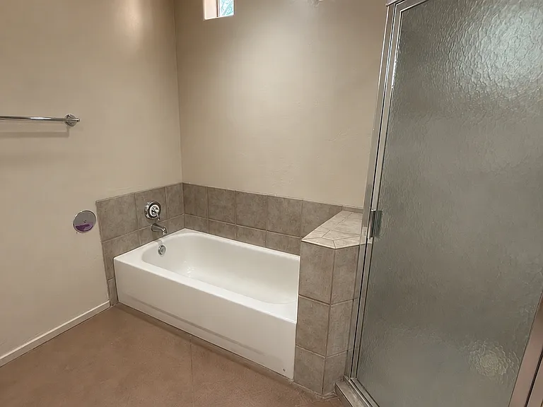 Master Bathroom Tub next to Shower