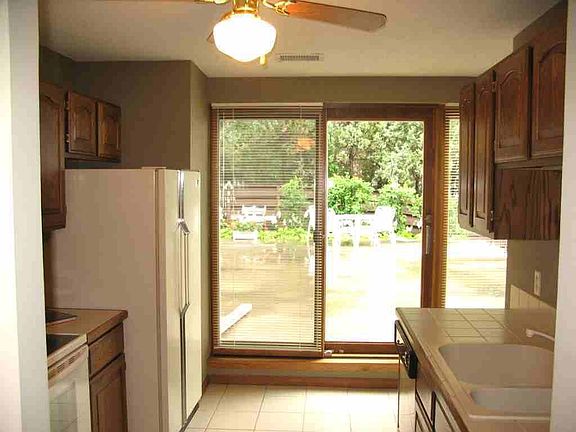 Kitchen walks out to huge patio overlooking water
