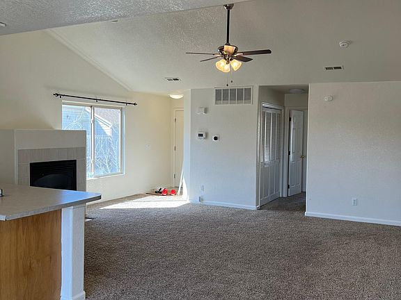 Vaulted ceilings provide elevated living and large windows let plenty of sunlight in