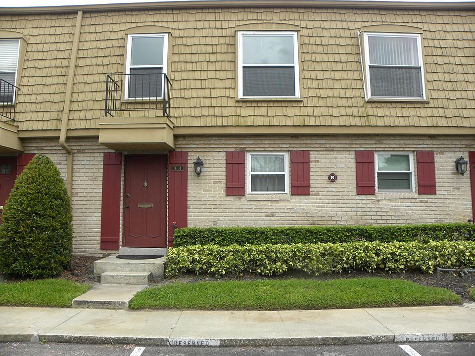 The front of the townhome, with available parking.