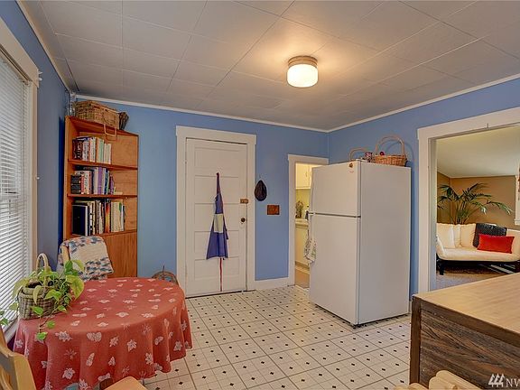 Very clean and tidy! Kitchen sink is past the frig. 2nd Bedroom is to the right.